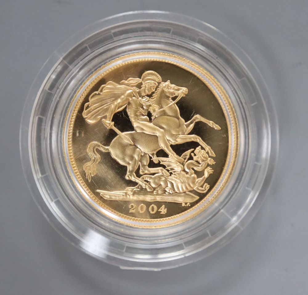 A 2004 gold proof sovereign.